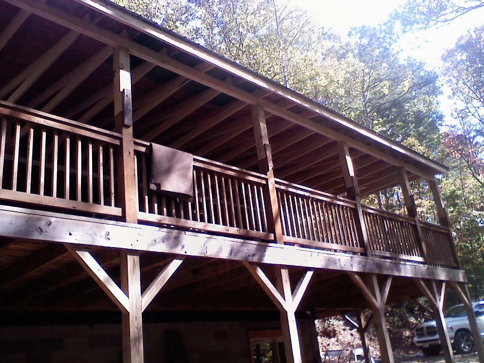 Timber framing under a new elevated porch and deck — Roof Leak Repair in South Mills by Roofing Brothers